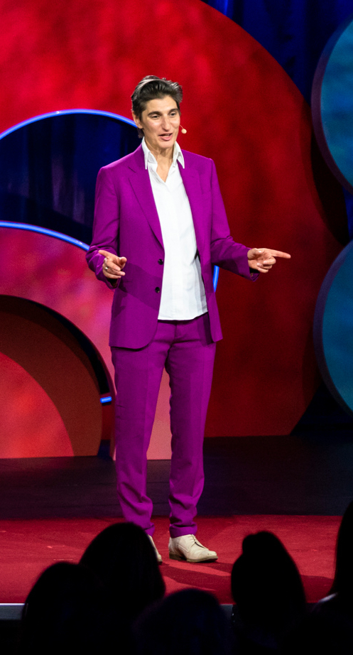 Photograph of Jess Search on stage at TED 2018