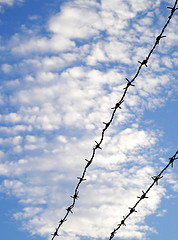 clouds_barbed_wire